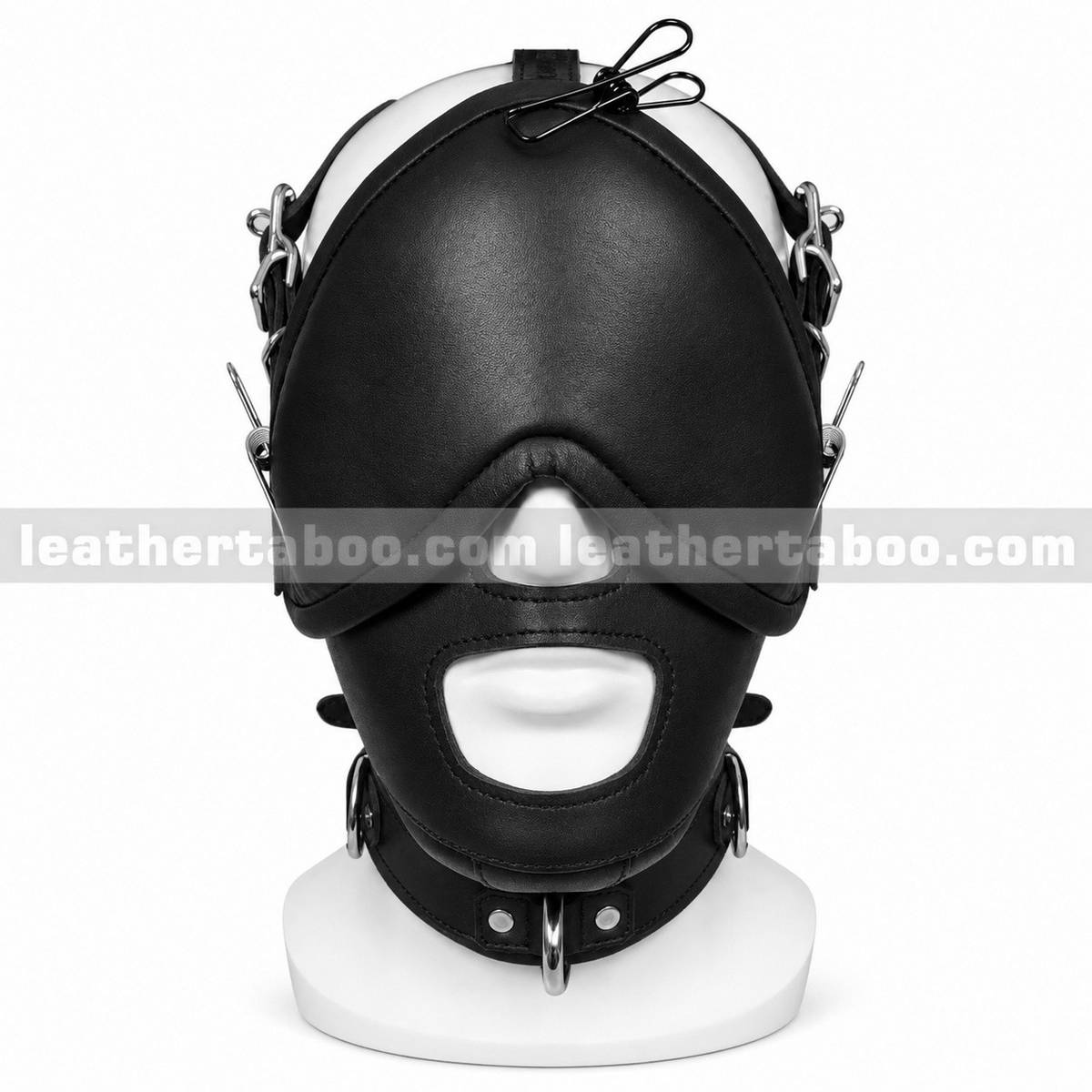 Front view of black leather face harness mask with broad eye cover, open nose and mouth, buckle straps and a D-ring collar on a white mannequin.