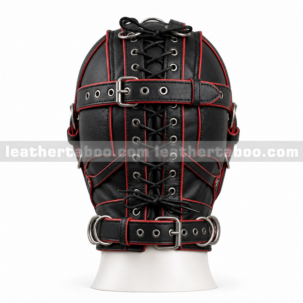 Rear view of black leather harness hood with red piping, central lace-up closure, horizontal buckle straps and metal eyelets on a white mannequin.